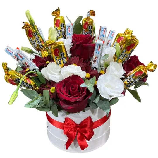 Caja pote con flores de estacion rosas y chocolates 